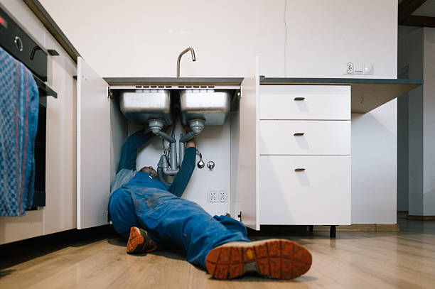 Professional Drain Cleaning technician working in Plain City, UT
